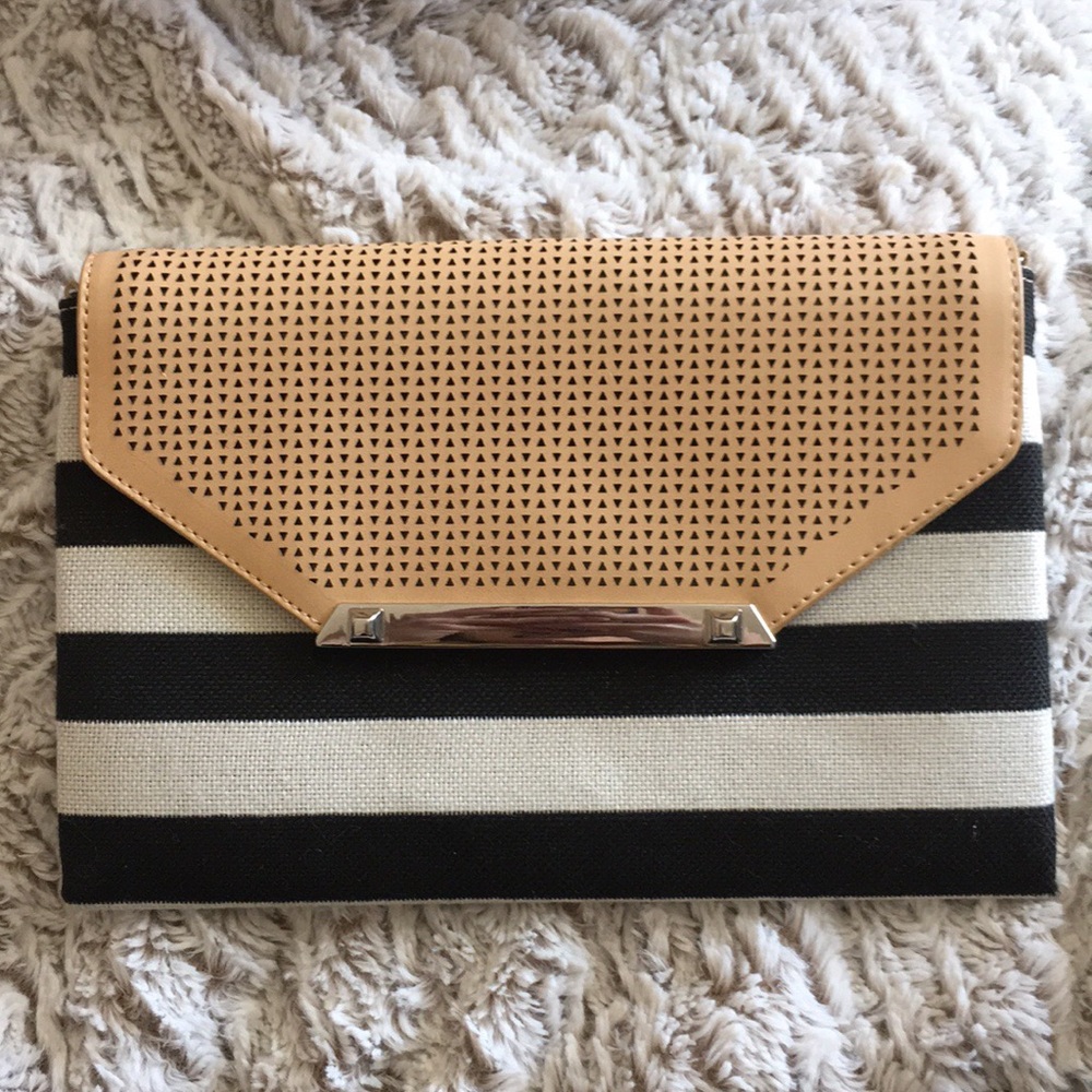 Stella and Dot hand stiched and leather clutch